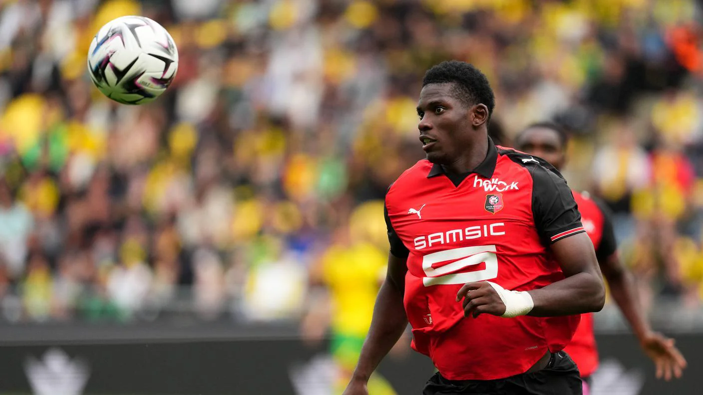 Breel Embolo celebrating after scoring for Switzerland during an international football match.