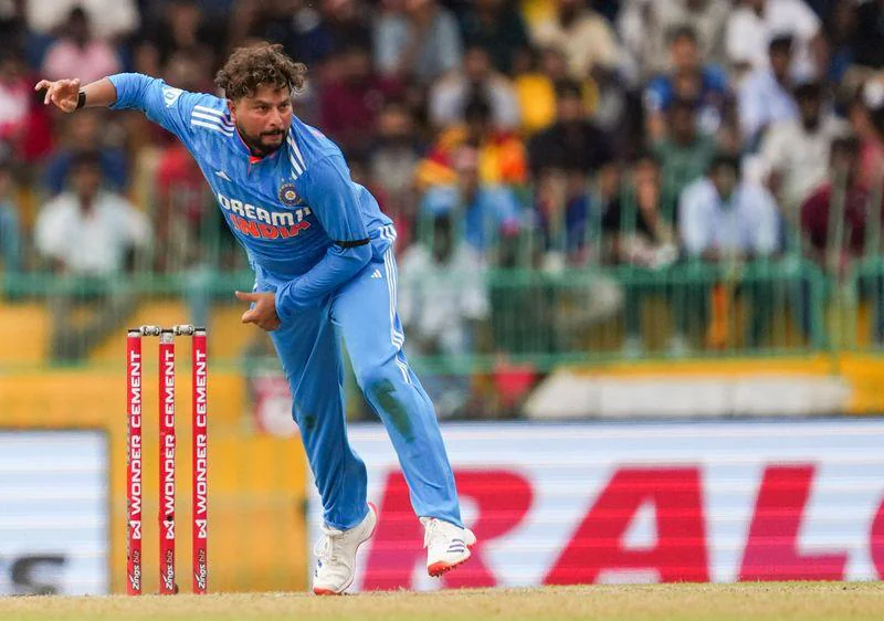 Kuldeep Yadav celebrating after taking a wicket for India during an international cricket match.